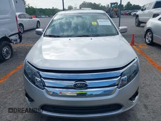 2011 Ford Fusion Hybrid z VIN 3FADP0L34BR208880, wystawiony jako IAAI lot #42432914 z przebiegiem 75 621 mil mil oraz . Historia ofert i sprzedaży dostępna na DreamBid. Obrazek 6.