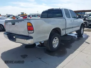 2000 Toyota Tundra SR5 with VIN 5TBRT3411YS070241, listed as a IAAI auction lot 41785990 with 204,276 mi miles and . Bid and sale history available at DreamBid. Image 4.