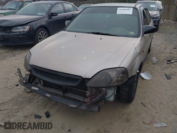 2000 Honda Civic LX with VIN 1HGEJ6672YL002709, listed as a IAAI auction lot 41680487 with 151,856 mi miles. Bid and sale history available at carsss.com. Image 6.