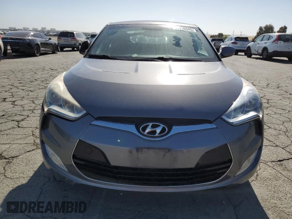 2012 Hyundai Veloster w/Gray Int z VIN KMHTC6AD9CU079542, wystawiony jako Copart lot #55998045 z przebiegiem 98 065 mil mil oraz Szkoda całkowita • Salvage title. Historia ofert i sprzedaży dostępna na DreamBid. Obrazek 5.