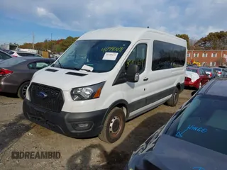 2023 Ford Transit Cargo with VIN 1FTBR1C86PKA52494, listed as a IAAI auction lot 40740671 with 9,999 mi miles and . Bid and sale history available at DreamBid. Image 2.
