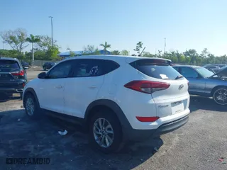 2018 Hyundai Tucson SE with VIN KM8J23A42JU627533, listed as a IAAI auction lot 41880112 with 61,840 mi miles. Bid and sale history available at carsss.com. Image 12.