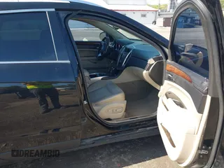2012 Cadillac SRX Luxury Collection with VIN 3GYFNAE33CS659315, listed as a IAAI auction lot 42169849 with 164,018 mi miles and . Bid and sale history available at carsss.com. Image 5.