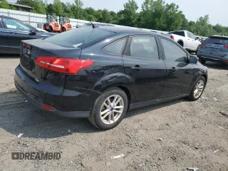 2017 Ford Focus SE with VIN 1FADP3FE7HL280968, listed as a Copart auction lot 60016415 with 90,832 mi miles and Clean title. Bid and sale history available at DreamBid. Image 3.