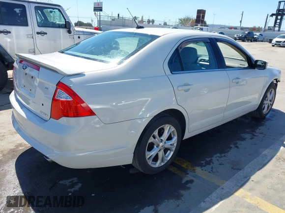 2012 Ford Fusion SE with VIN 3FAHP0HG1CR419324, listed as a IAAI auction lot 41832151 with 143,474 mi miles and . Bid and sale history available at DreamBid. Image 4.