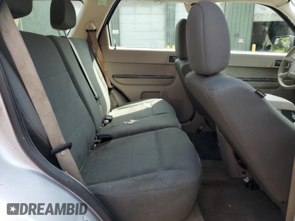 2011 Ford Escape XLS z VIN 1FMCU0C75BKA71501, wystawiony jako Copart lot #62614335 z przebiegiem 130 210 mil mil oraz Szkoda całkowita • Salvage title. Historia ofert i sprzedaży dostępna na DreamBid. Obrazek 10.