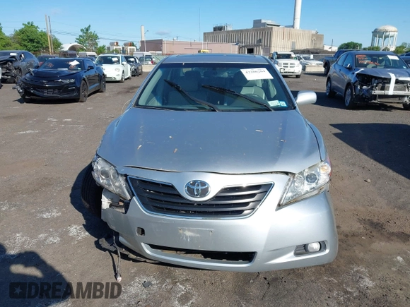 2007 Toyota Camry LE z VIN JTNBK46K473003622, wystawiony jako IAAI lot #42286264 z przebiegiem 105 630 mil mil oraz . Historia ofert i sprzedaży dostępna na DreamBid. Obrazek 13.