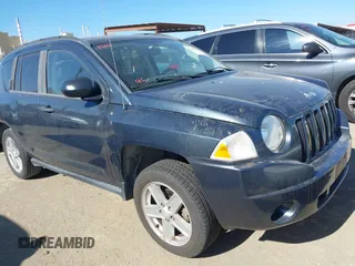 2007 Jeep Compass Sport with VIN 1J8FF47W27D110618, listed as a IAAI auction lot 42195311 with 135,128 mi miles and . Bid and sale history available at carsss.com. Image 1.