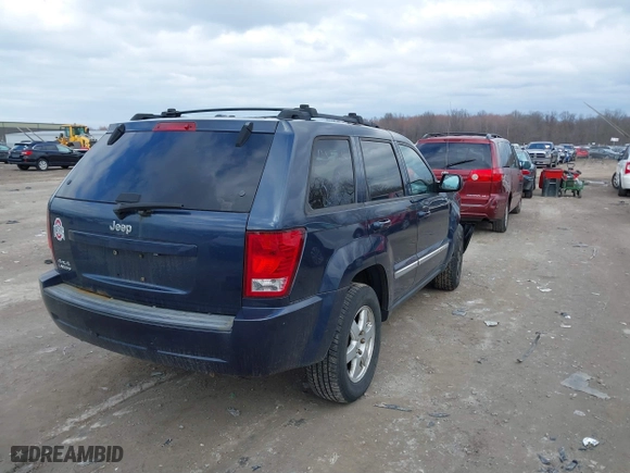 2010 Jeep Grand Cherokee Laredo with VIN 1J4PR4GK5AC138498, listed as a IAAI auction lot 41870740 with 130,551 mi miles. Bid and sale history available at carsss.com. Image 4.