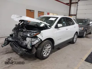 2018 Chevrolet Equinox LT z VIN 3GNAXJEV9JL410690, wystawiony jako IAAI lot #41571620 z przebiegiem 21 797 mil mil oraz . Historia ofert i sprzedaży dostępna na DreamBid. Obrazek 2.