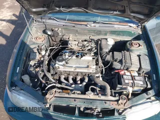 2001 Mitsubishi Mirage ES z VIN JA3AY26C91U041410, wystawiony jako IAAI lot #41360183 z przebiegiem 322 178 mil mil oraz . Historia ofert i sprzedaży dostępna na DreamBid. Obrazek 10.