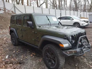 2021 Jeep Wrangler Unlimited Willys with VIN 1C4HJXDNXMW579595, listed as a IAAI auction lot 41930989 with 32,148 mi miles and . Bid and sale history available at DreamBid. Image 1.