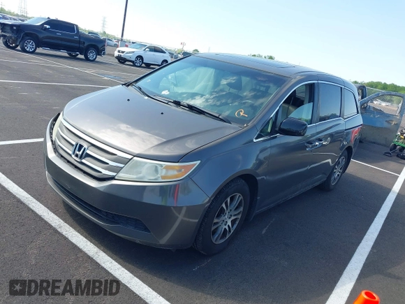 2011 Honda Odyssey EX-L with VIN 5FNRL5H62BB058765, listed as a IAAI auction lot 42017802 with 178,512 mi miles and . Bid and sale history available at carsss.com. Image 17.