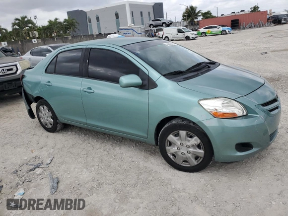 2007 Toyota Yaris with VIN JTDBT923271052472, listed as a Copart auction lot 50942975 with 147,363 mi miles and Salvage Title. Bid and sale history available at DreamBid. Image 4.