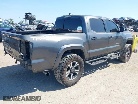 2017 Toyota Tacoma SR5 with VIN 3TMCZ5AN4HM052380, listed as a IAAI auction lot 42277918 with 62,238 mi miles and . Bid and sale history available at DreamBid. Image 4.