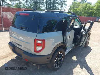 2022 Ford Bronco Sport Outer Banks z VIN 3FMCR9C67NRD82022, wystawiony jako IAAI lot #41968977 z przebiegiem 48 976 mil mil oraz . Historia ofert i sprzedaży dostępna na DreamBid. Obrazek 4.