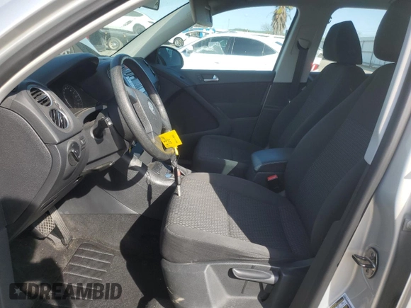 2010 Volkswagen Tiguan S with VIN WVGAV7AX9AW519312, listed as a Copart auction lot 48633055 with 94,740 mi miles and Salvage title. Bid and sale history available at DreamBid. Image 7.