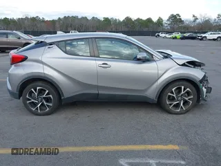 2019 Toyota C-HR XLE with VIN NMTKHMBX7KR078292, listed as a IAAI auction lot 41705966 with 104,352 mi miles. Bid and sale history available at carsss.com. Image 14.
