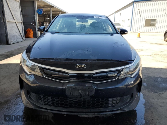 2018 Kia Optima Hybrid Premium with VIN KNAGT4LE3J5023262, listed as a Copart auction lot 65211244 with 142,212 mi miles and Salvage Title. Bid and sale history available at carsss.com. Image 5.