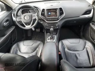 2014 Jeep Cherokee Trailhawk with VIN 1C4PJMBS4EW160341, listed as a Copart auction lot 60761475 with 135,087 mi miles and Salvage title. Bid and sale history available at DreamBid. Image 8.