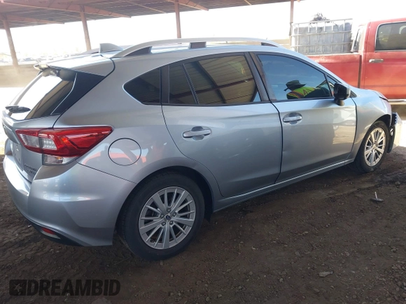 2017 Subaru Impreza Premium z VIN 4S3GTAB69H3703779, wystawiony jako IAAI lot #42151284 z przebiegiem 135 455 mil mil oraz . Historia ofert i sprzedaży dostępna na DreamBid. Obrazek 4.