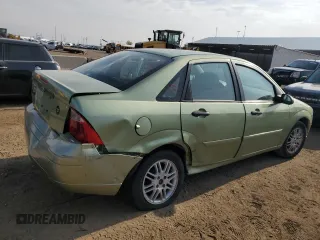 2007 Ford Focus S with VIN 1FAFP34N57W138756, listed as a Copart auction lot 54402375 with 260,127 mi miles and Salvage title. Bid and sale history available at DreamBid. Image 3.
