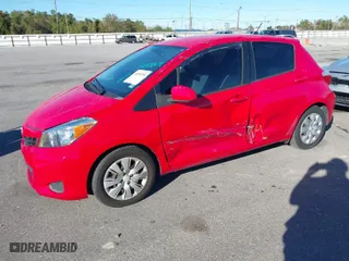 2012 Toyota Yaris L with VIN JTDKTUD33CD503112, listed as a IAAI auction lot 41093304 with 179,744 mi miles. Bid and sale history available at carsss.com. Image 6.