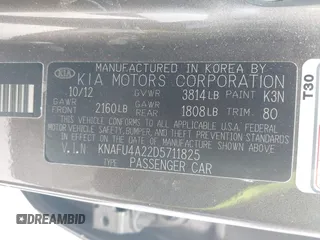 2013 Kia Forte EX with VIN KNAFU4A22D5711825, listed as a IAAI auction lot 42128778 with 112,889 mi miles. Bid and sale history available at carsss.com. Image 9.