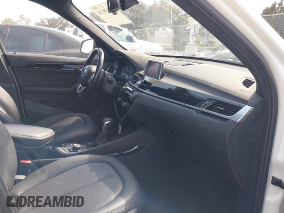 2018 BMW X1 xDrive28i with VIN WBXHT3C37J5K28375, listed as a IAAI auction lot 42039336 with 28,664 mi miles. Bid and sale history available at carsss.com. Image 5.