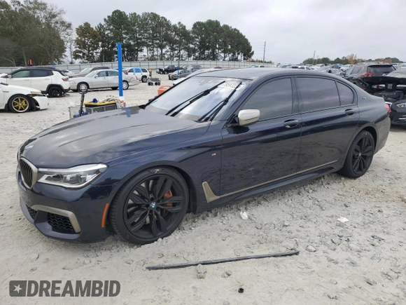 2019 BMW 7 Series M760i xDrive with VIN WBA7H6C51KG615276, listed as a Copart auction lot 79597234 with 39,195 mi miles and Salvage Title. Bid and sale history available at carsss.com. Image 1.