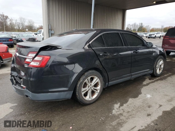 2015 Ford Taurus SEL with VIN 1FAHP2E94FG137935, listed as a Copart auction lot 80921824 with 172,324 mi miles and Salvage Title. Bid and sale history available at DreamBid. Image 3.