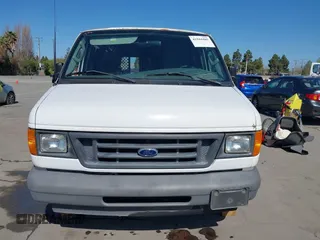2003 Ford Econoline Cargo with VIN 1FTNE24L23HB81499, listed as a IAAI auction lot 41944485 with 86,629 mi miles and . Bid and sale history available at DreamBid. Image 12.