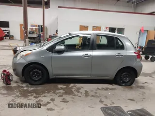 2009 Toyota Yaris with VIN JTDKT903695262863, listed as a IAAI auction lot 41456767 with 206,534 mi miles and . Bid and sale history available at DreamBid. Image 14.