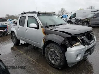 2015 Nissan Frontier SV with VIN 1N6AD0EV9FN748932, listed as a Copart auction lot 50177325 with Not provided miles and Salvage title. Bid and sale history available at DreamBid. Image 4.