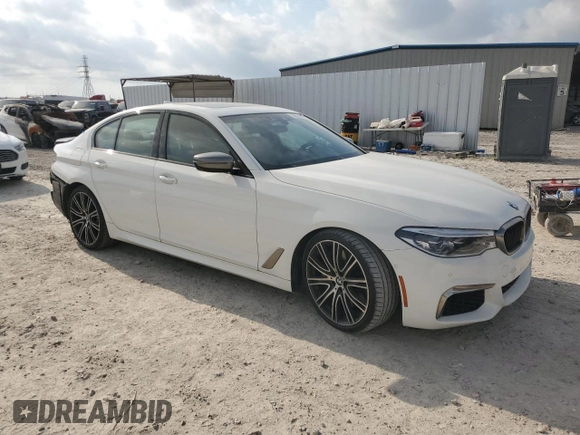 2018 BMW 5 Series M550i xDrive with VIN WBAJB9C58JG464461, listed as a Copart auction lot 53626575 with 62,436 mi miles and Salvage Title. Bid and sale history available at carsss.com. Image 4.
