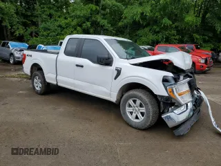 2021 Ford F-150 XL with VIN 1FTFX1E51MFC05216, listed as a Copart auction lot 56571785 with 94,584 mi miles and Salvage title. Bid and sale history available at DreamBid. Image 4.