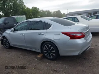 2018 Nissan Altima SR with VIN 1N4AL3AP6JC151861, listed as a IAAI auction lot 40010666 with 140,228 mi miles and . Bid and sale history available at DreamBid. Image 14.