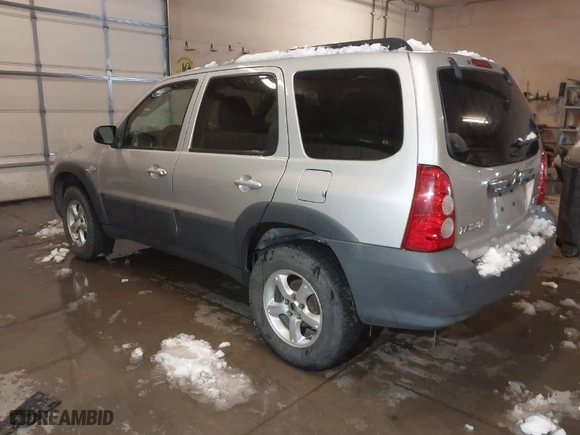 2006 Mazda Tribute i with VIN 4F2YZ02Z86KM37861, listed as a IAAI auction lot 41495015 with 125,655 mi miles. Bid and sale history available at carsss.com. Image 3.