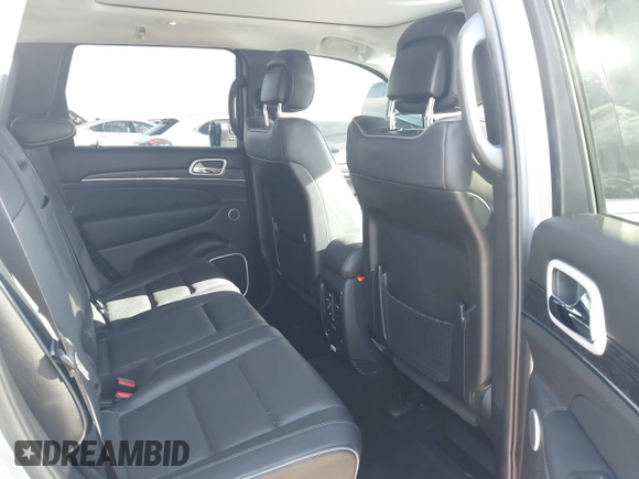 2020 Jeep Grand Cherokee Summit z VIN 1C4RJFJG2LC173184, wystawiony jako IAAI lot #41343182 z przebiegiem 70 192 mil mil oraz . Historia ofert i sprzedaży dostępna na DreamBid. Obrazek 8.
