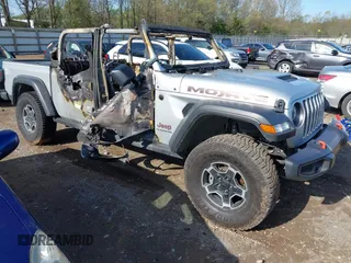 2022 Jeep Gladiator Mojave z VIN 1C6JJTEG0NL118085, wystawiony jako IAAI lot #41984137 z przebiegiem Nie podano mil oraz . Historia ofert i sprzedaży dostępna na DreamBid. Obrazek 1.