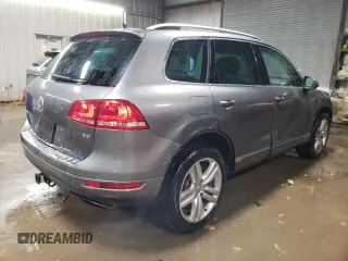 2013 Volkswagen Touareg Lux with VIN WVGEF9BP6DD002607, listed as a Copart auction lot 83420704 with 143,571 mi miles and Salvage Title. Bid and sale history available at DreamBid. Image 3.