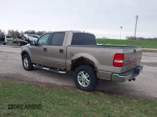 2004 Ford F-150 XLT with VIN 1FTPW145X4KD20526, listed as a IAAI auction lot 41959462 with 166,545 mi miles. Bid and sale history available at carsss.com. Image 3.