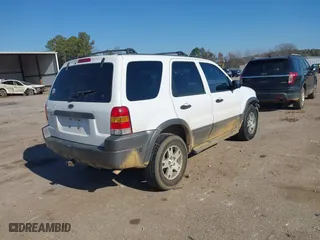2004 Ford Escape XLT with VIN 1FMYU93174KA45992, listed as a IAAI auction lot 41169340 with 308,987 mi miles. Bid and sale history available at carsss.com. Image 4.