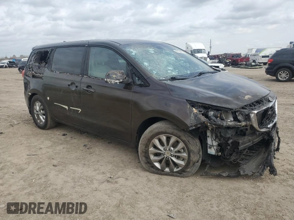 2021 Kia Sedona LX with VIN KNDMB5C17M6665266, listed as a Copart auction lot 48129495 with 57,274 mi miles and Salvage Title. Bid and sale history available at carsss.com. Image 4.