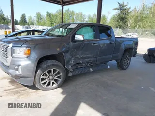 2021 GMC Canyon 4WD Denali with VIN 1GTG6EEN5M1102747, listed as a IAAI auction lot 42121134 with 60,412 mi miles and . Bid and sale history available at DreamBid. Image 17.