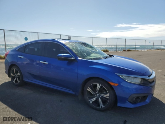 2017 Honda Civic Sedan Touring with VIN 19XFC1F97HE029141, listed as a Copart auction lot 44219085 with 101,799 mi miles and Salvage Title. Bid and sale history available at carsss.com. Image 4.
