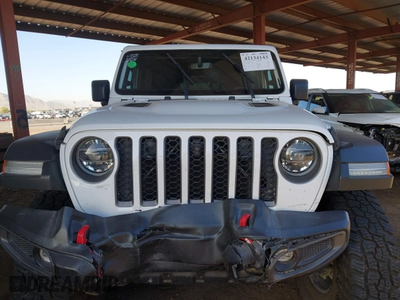 2022 Jeep Gladiator Rubicon with VIN 1C6JJTBM6NL145009, listed as a IAAI auction lot 42134143 with 59,438 mi miles and . Bid and sale history available at DreamBid. Image 12.