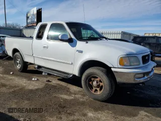 1997 Ford F-150 XL with VIN 1FTDX1866VKB08985, listed as a Copart auction lot 43708935 with 208,670 mi miles and Salvage title. Bid and sale history available at DreamBid. Image 4.