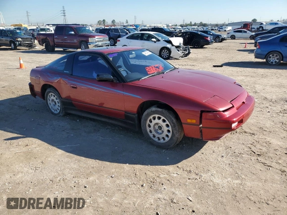 1989 Nissan 240SX z VIN RS13604765, wystawiony jako Copart lot #46514985 z przebiegiem 115 929 mil mil oraz Szkoda całkowita • Salvage title. Historia ofert i sprzedaży dostępna na DreamBid. Obrazek 4.