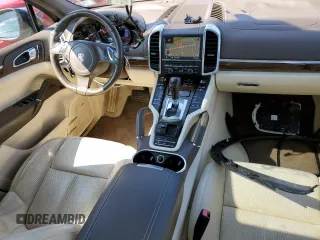 2011 Porsche Cayenne с VIN WP1AA2A25BLA10410, выставлен на аукционе Copart как лот 67706594 с пробегом 41 318 миль миль и Списание • Salvage title. История ставок и продаж доступна на DreamBid. Изображение 8.